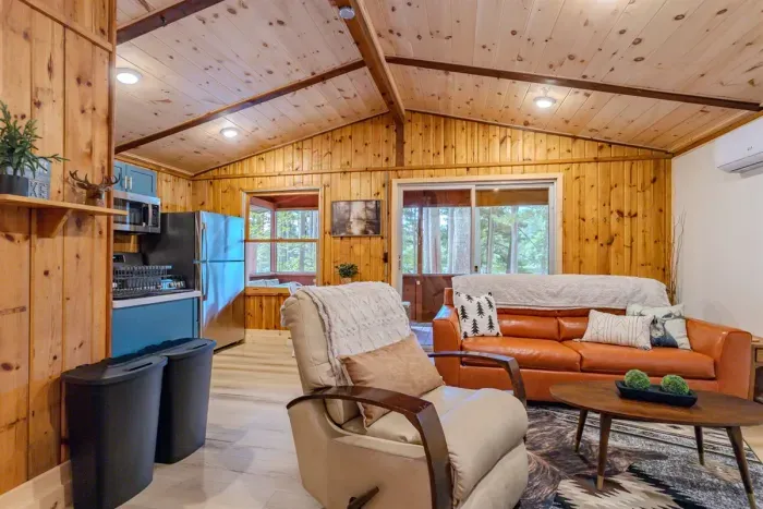 Indulge in comfort and style in our living room, featuring plush sofas, and elegant chairs. Cozy up by the fireplace, and unwind with entertainment on the TV.