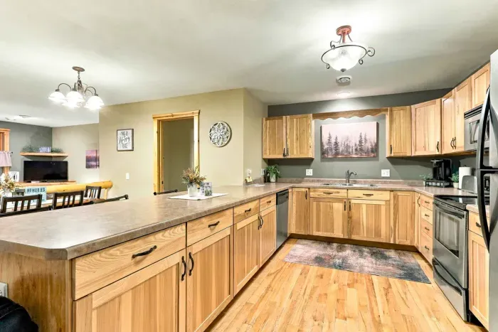 Enjoy the convenience of home while on vacation! Outfitted with stainless steel appliances, plentiful cabinet storage, and essential countertop appliances, preparing everything from quick snacks to full family dinners is effortless