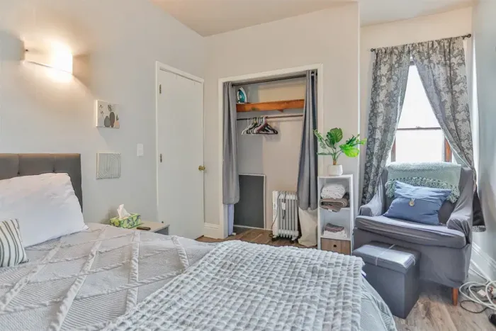 Luxurious master bedroom with a king-size bed for ultimate comfort