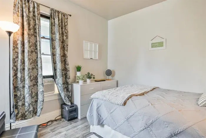 Luxurious master bedroom with a king-size bed for ultimate comfort