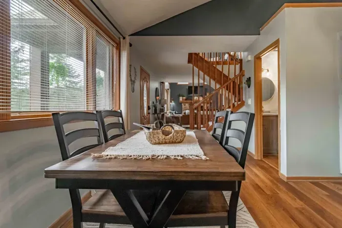 Modern and efficient—everything you need to create a delicious meal. The kitchen features a stainless steel refrigerator, stove, coffee maker, kitchenette oven, kettle, and blender