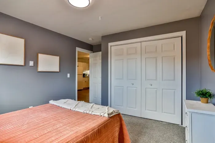 Luxurious master bedroom with a king-size bed for ultimate comfort