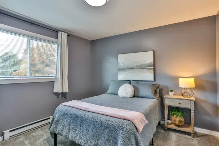 Luxurious master bedroom with a full-size bed for ultimate comfort