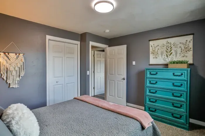 Luxurious master bedroom with a king-size bed for ultimate comfort