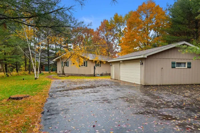 Inviting cabin retreat surrounded by crisp autumn scenery
