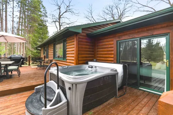Outdoor hot tub perfect for romantic nights or stress-free relaxation.