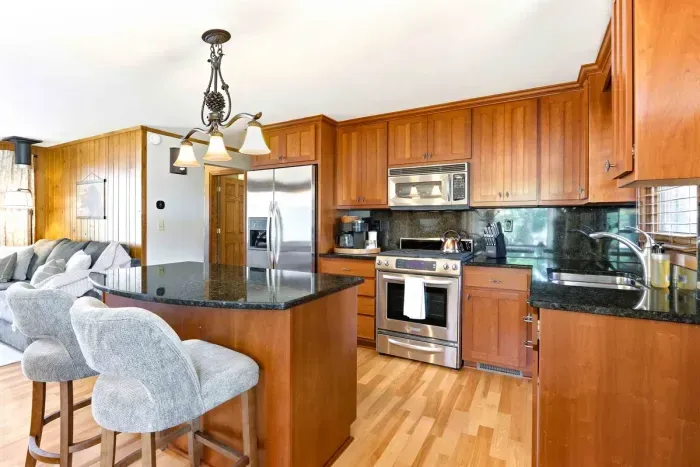 Cook and dine with ease in a well-equipped kitchen space.