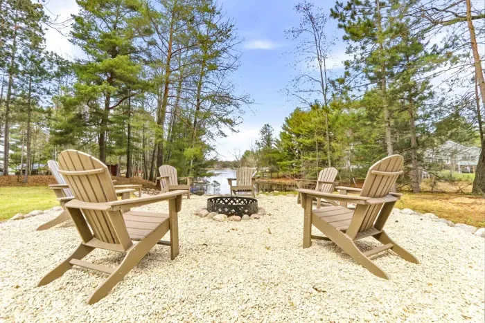 Quiet waterfront escape surrounded by trees and natural beauty.