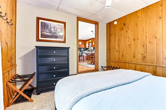 Inviting bedroom with plush bed and restful atmosphere.