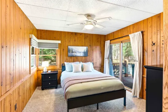 Stylish bedroom with cozy bedding and calm vibes.