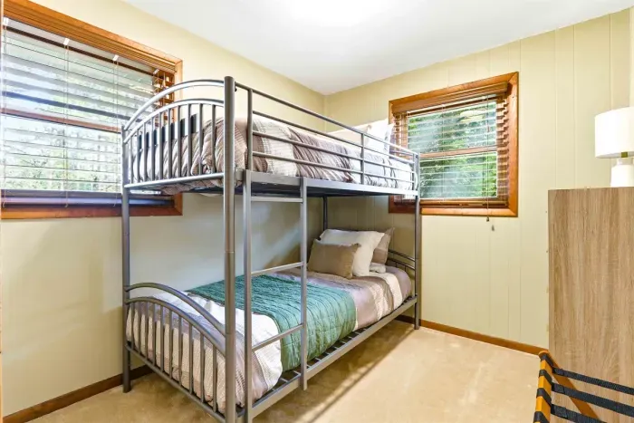 Cozy bunk bed bedroom perfect for families and groups.