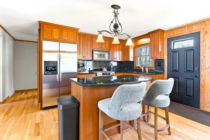 Bright kitchen space with essential cooking amenities.