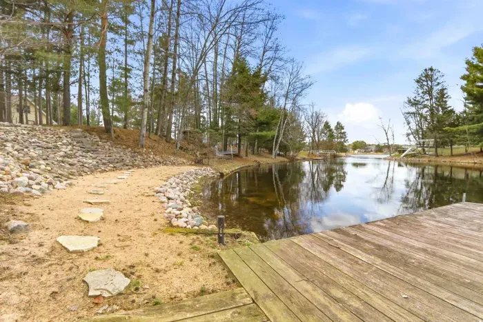Scenic riverfront escape with relaxing nature and dock access.