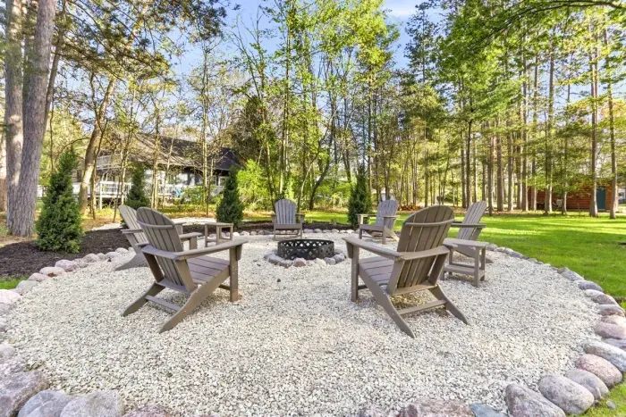 Settle into Adirondack chairs, enjoy the wooded views, and let the simple comfort of lakeside life take over.