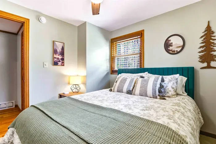 Stylish cozy bedroom ideal for relaxing stays.