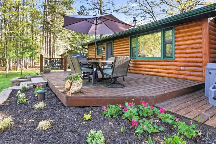 Gather on the deck, take in the wooded views, and let lake-country living unfold all around you.