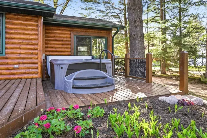 From morning coffee to evening soaks, this inviting outdoor space brings comfort and relaxation right to the cabin door.