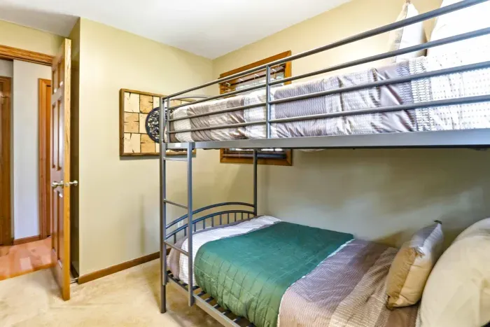 Simple and cozy bunk room perfect for group accommodations.