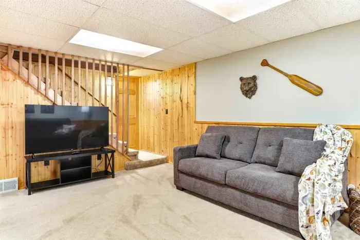 Private hangout space with home bar and relaxed seating area.