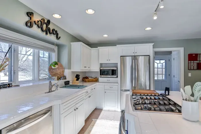 This kitchen offers sleek surfaces, and all the essentials for a comfortable and efficient cooking experience, perfect for short or extended stays.