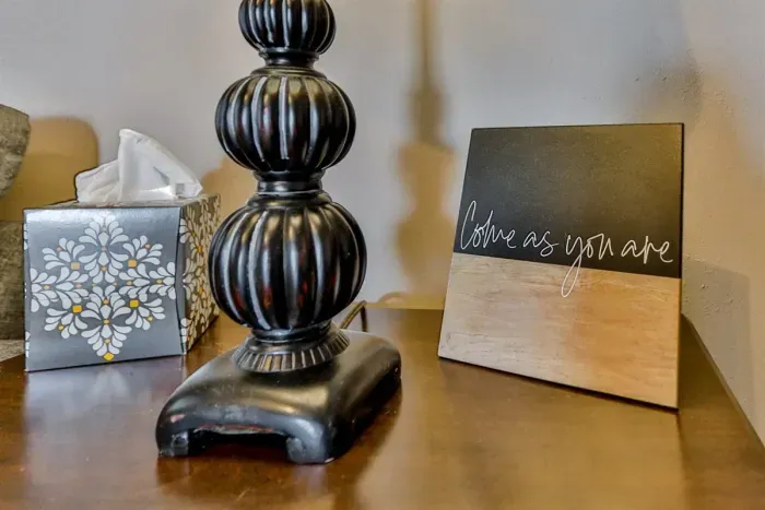 Warm, neutral tabletop decor with earthy tones and a cozy, modern-rustic style.