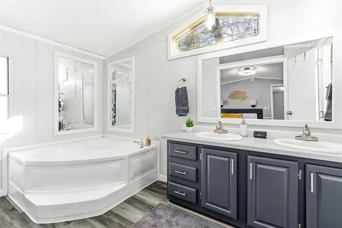 Serene bathroom with double vanity and spa-like feel.