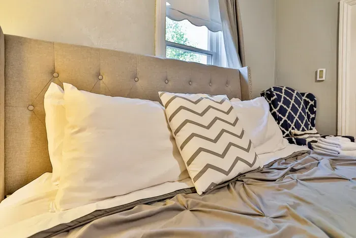 Settle into the inviting bedroom with queen bed, perfect for a restful night after exploring the area.