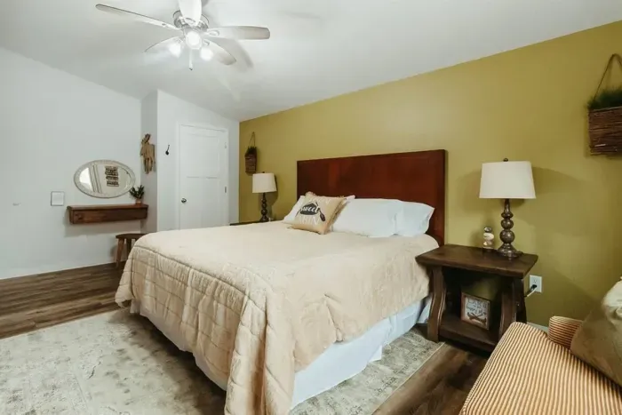 Wake up refreshed – our bedroom offers a peaceful retreat amidst the city buzz.

King sized bed
Ceiling fan
Plush bedroom interior