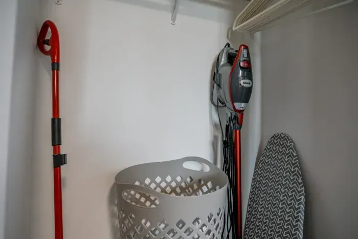 Spacious closet with shelves and hangers, offering ample room for your clothing and belongings, perfect for an organized stay.