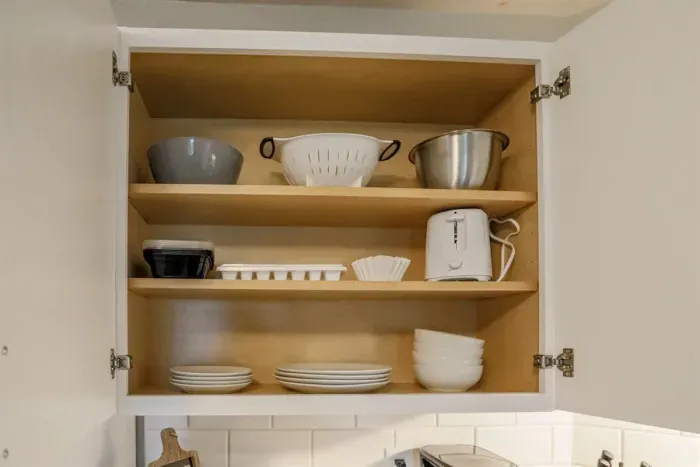 Fully equipped kitchen with stainless steel appliances, perfect for cooking homemade meals during your stay. Enjoy the convenience of a coffee maker, microwave, and a large refrigerator.