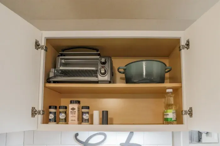 Fully equipped kitchen with stainless steel appliances, perfect for cooking homemade meals during your stay. Enjoy the convenience of a coffee maker, microwave, and a large refrigerator.