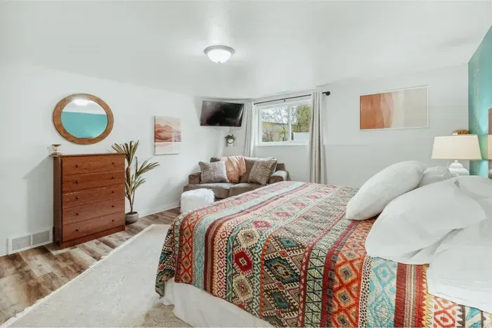 Your private sanctuary awaits – enjoy a restful night's sleep in our cozy bedroom.

Queen bed

Television

Soft sofa

