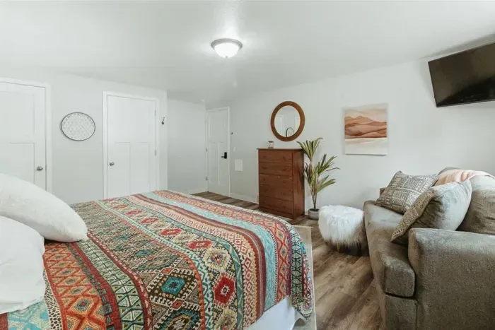 Your private sanctuary awaits – enjoy a restful night's sleep in our cozy bedroom.

Queen bed

Television

Soft sofa

