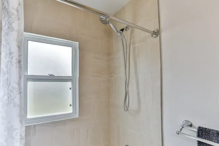 Bright bathroom space with a simple, hygienic, and relaxing design.