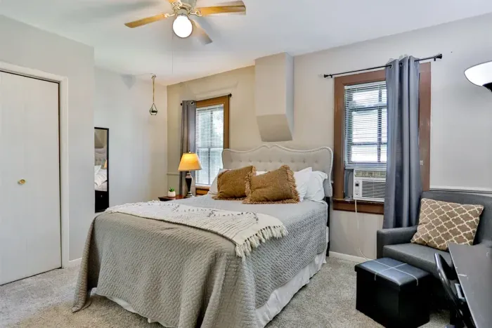 Luxurious master bedroom with a king-size bed for ultimate comfort