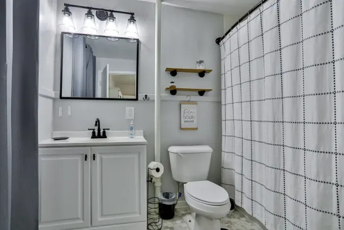 Luxurious master bedroom with a king-size bed for ultimate comfort