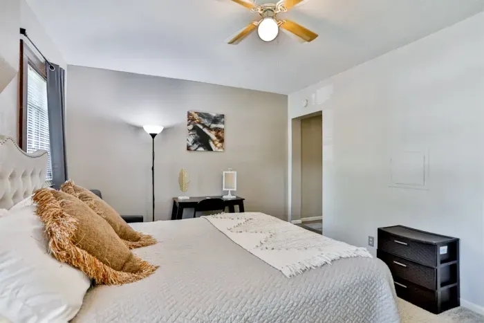 Luxurious master bedroom with a king-size bed for ultimate comfort