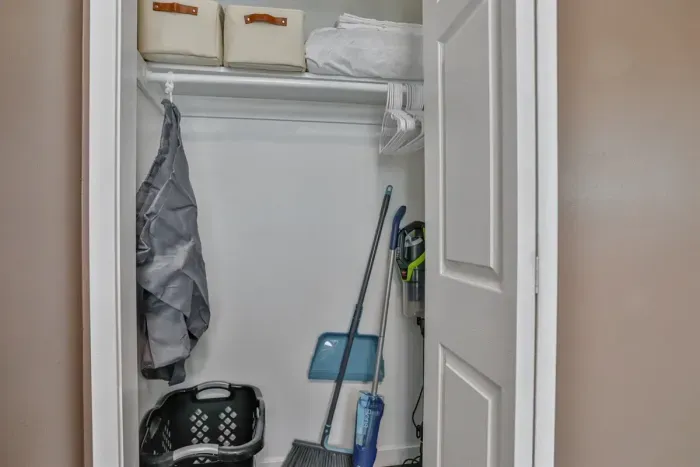 Well-stocked and convenient—our cleaning closet is equipped with everything you need to keep the space tidy and organized.