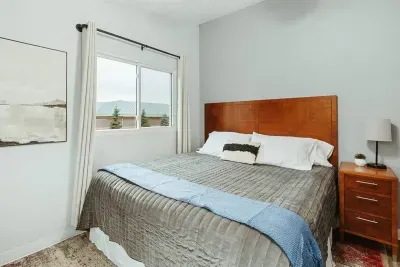 Your private sanctuary awaits – enjoy a restful night's sleep in our cozy bedroom.