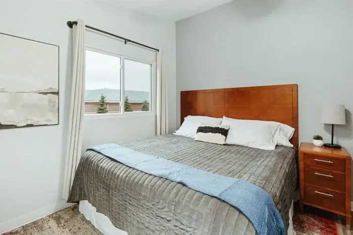 Your private sanctuary awaits – enjoy a restful night's sleep in our cozy bedroom.