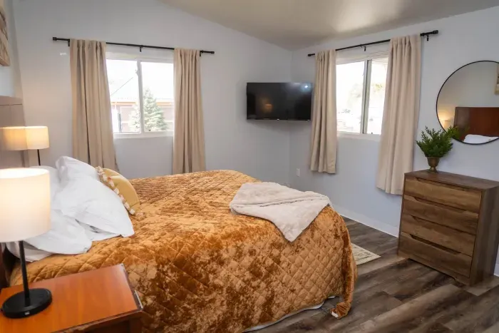 Your private sanctuary awaits – enjoy a restful night's sleep in our cozy bedroom.