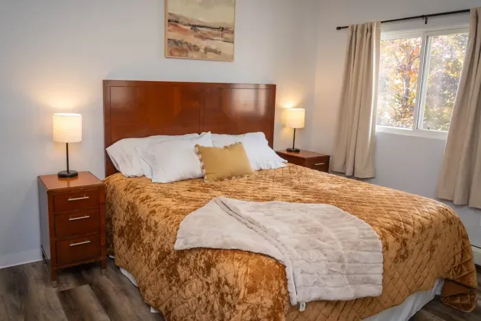 Your private sanctuary awaits – enjoy a restful night's sleep in our cozy bedroom.