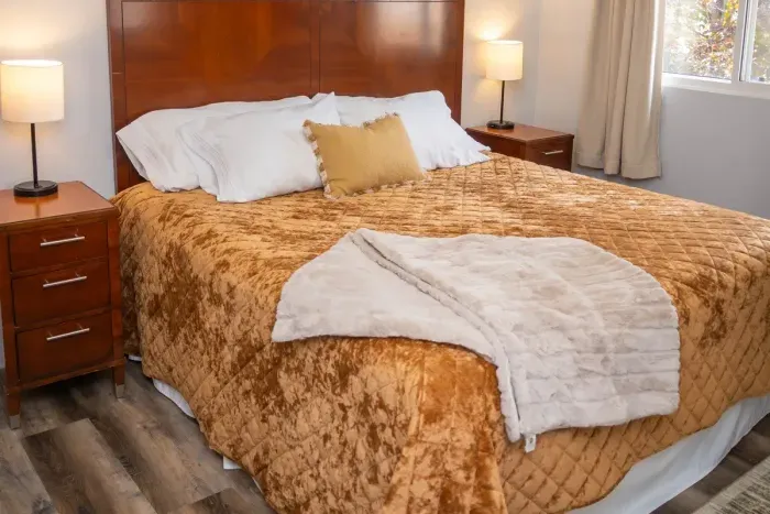 Your private sanctuary awaits – enjoy a restful night's sleep in our cozy bedroom.