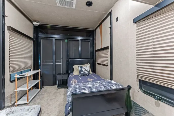 Twin bedroom inside the camper - great for friends or rodeo partners.