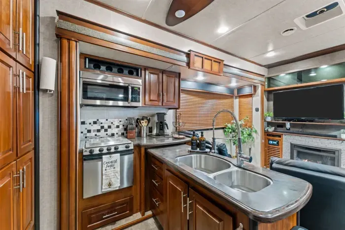 Full-size kitchen inside the camper - great for preparing simple meals during your stay.
