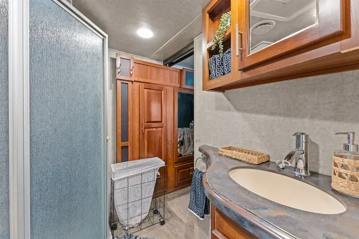 Private bathroom with shower inside the camper for a convenient and comfortable stay