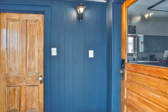 Our home features a dedicated back entrance that combines vintage charm with modern security, making it a breeze to come and go during your stay.