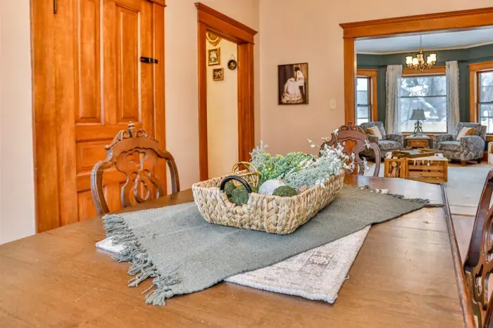 Warm and inviting dining space with vintage charm, creating a cozy yet elegant spot for meals, gatherings, or relaxing after a day of exploring.