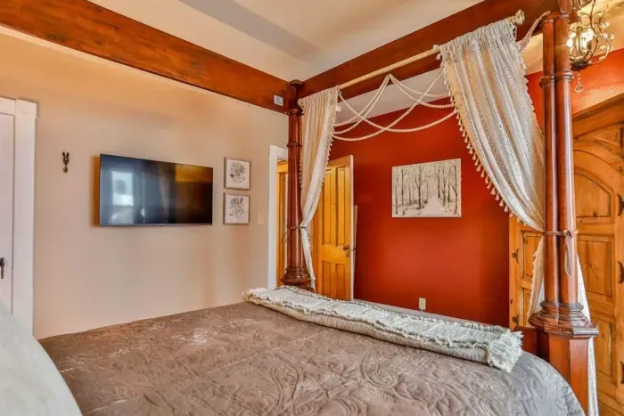 A peaceful retreat with vintage charm, plush bedding, and a relaxing atmosphere.