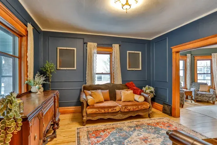 Enjoy hardwood floors, elegant decor, that create a warm, and vintage inviting space perfect for relaxing after a day of exploring.